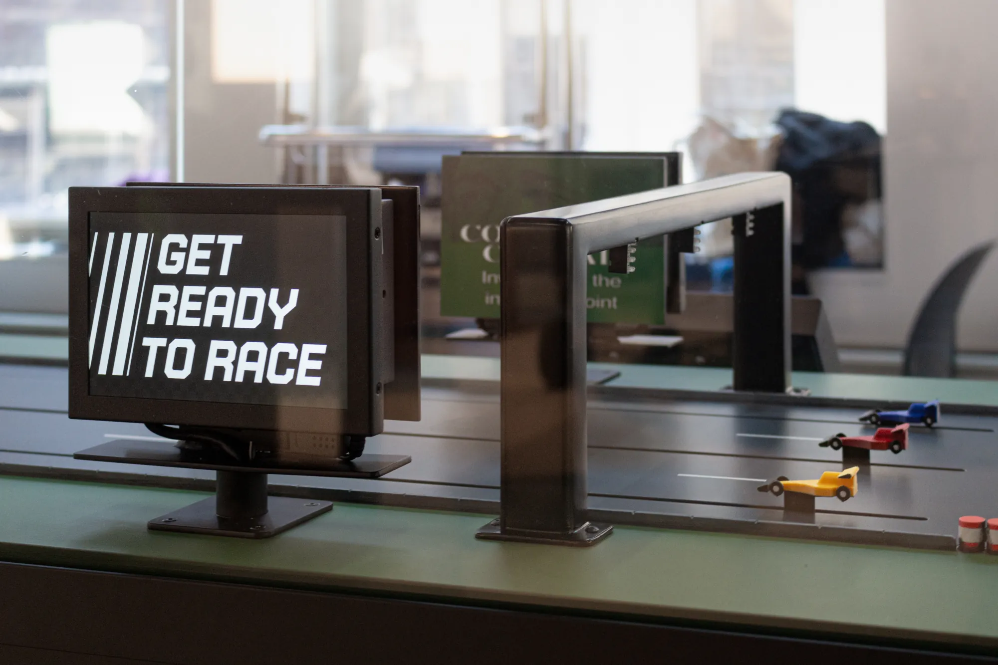 Jumbotron display showing race results